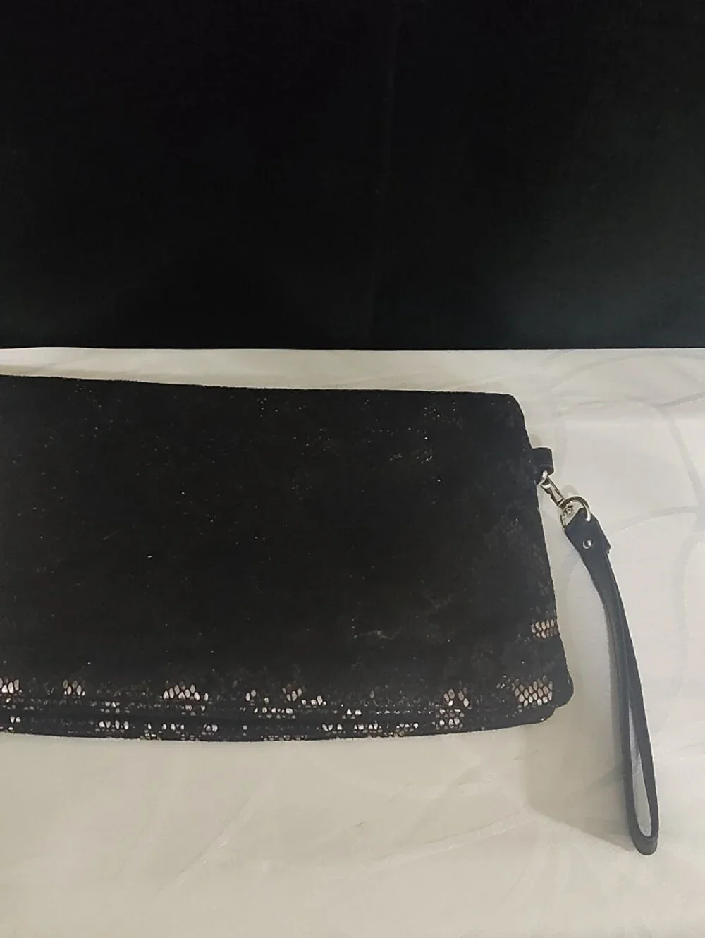 Snake-Print Metallic Clutch Wristlet in Black and Silver